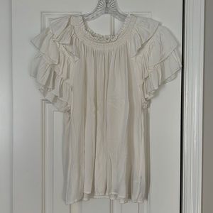 Like New! white luxe top with ruffle shoulders
